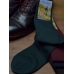Зеленые шерстяные носки в рубчик VITRANO